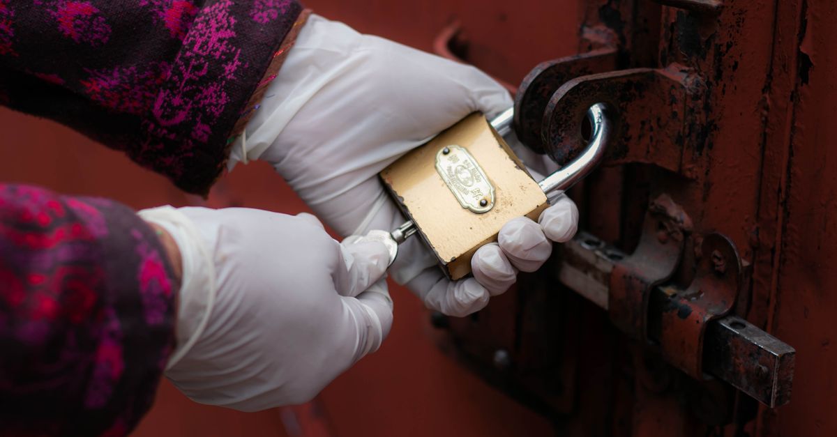 locksmith unlocking front door — Broadway Locksmith and Automotive Corp